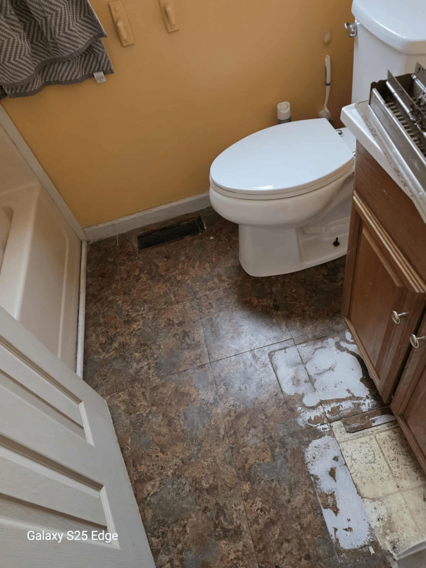 Before placing new tile down in bathroom project